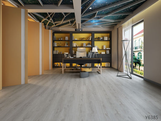Light gray vinyl plank flooring in Orlando by JVB Decor – waterproof and modern design.