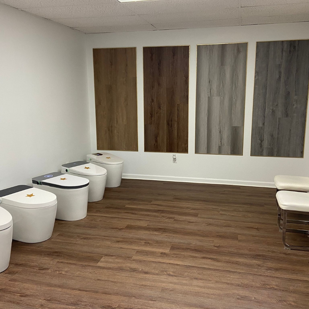 Luxury vinyl plank samples mounted in the JVB Decor showroom in Orlando